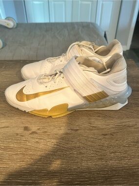 Nike Savaleos White and Metallic Gold Low-Top Training Sneakers